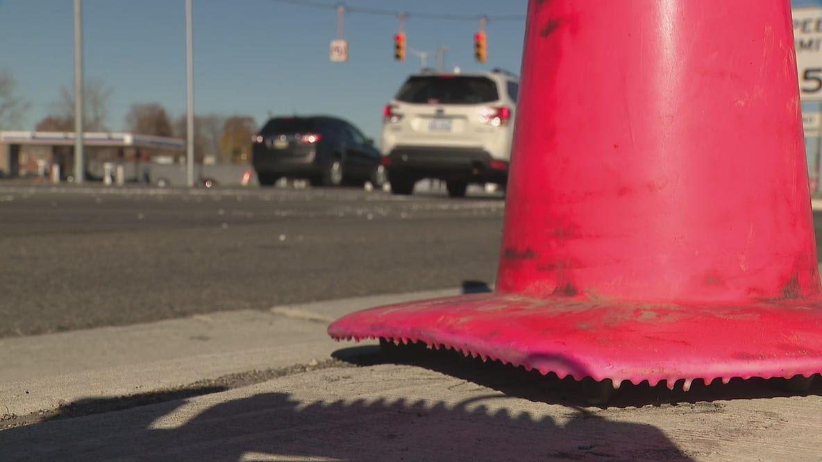 Dead woman found inside car at I-94 and Gratiot; driver arrested